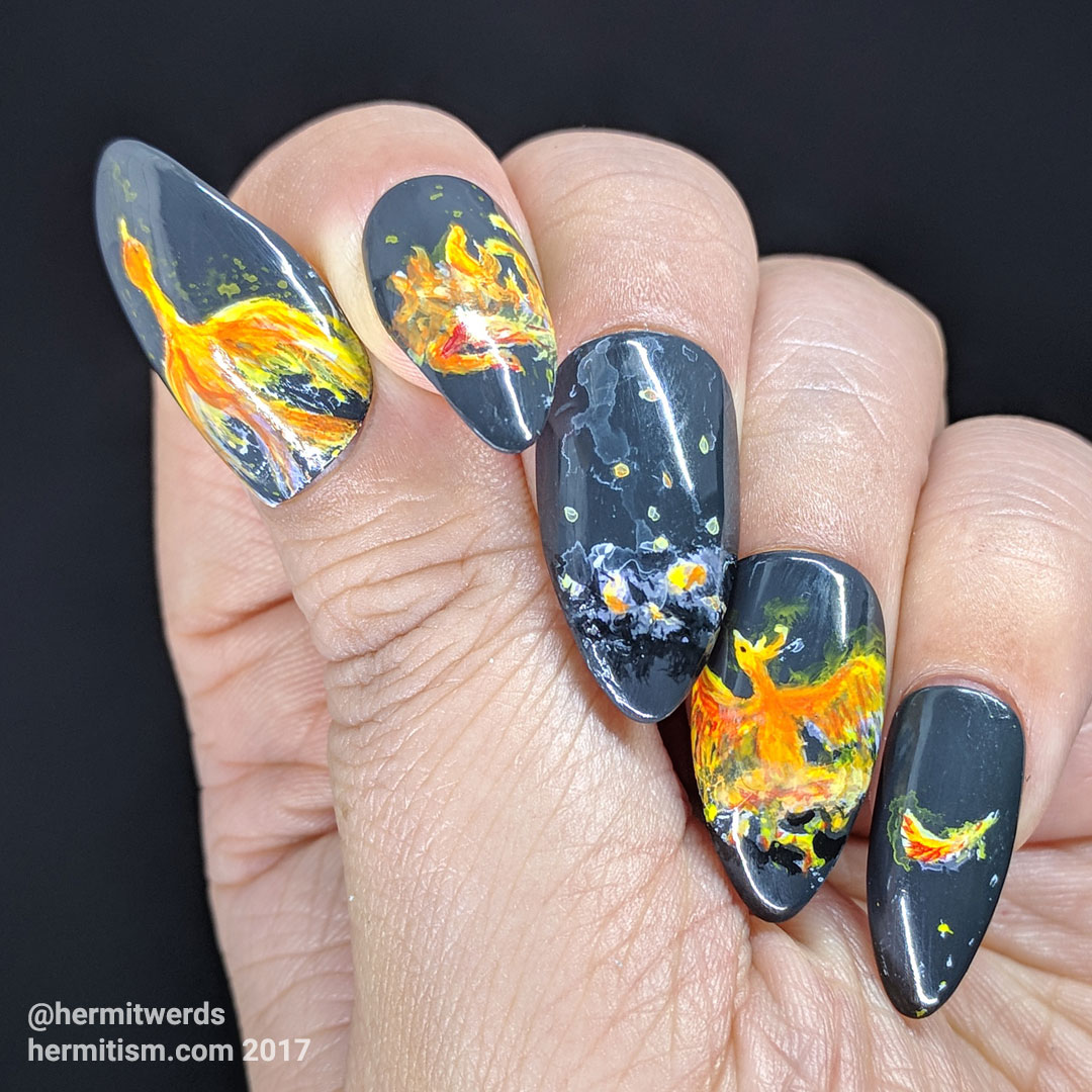 Phoenix Rising - Hermit Werds - false nails depicting the death and rebirth cycle of a phoenix