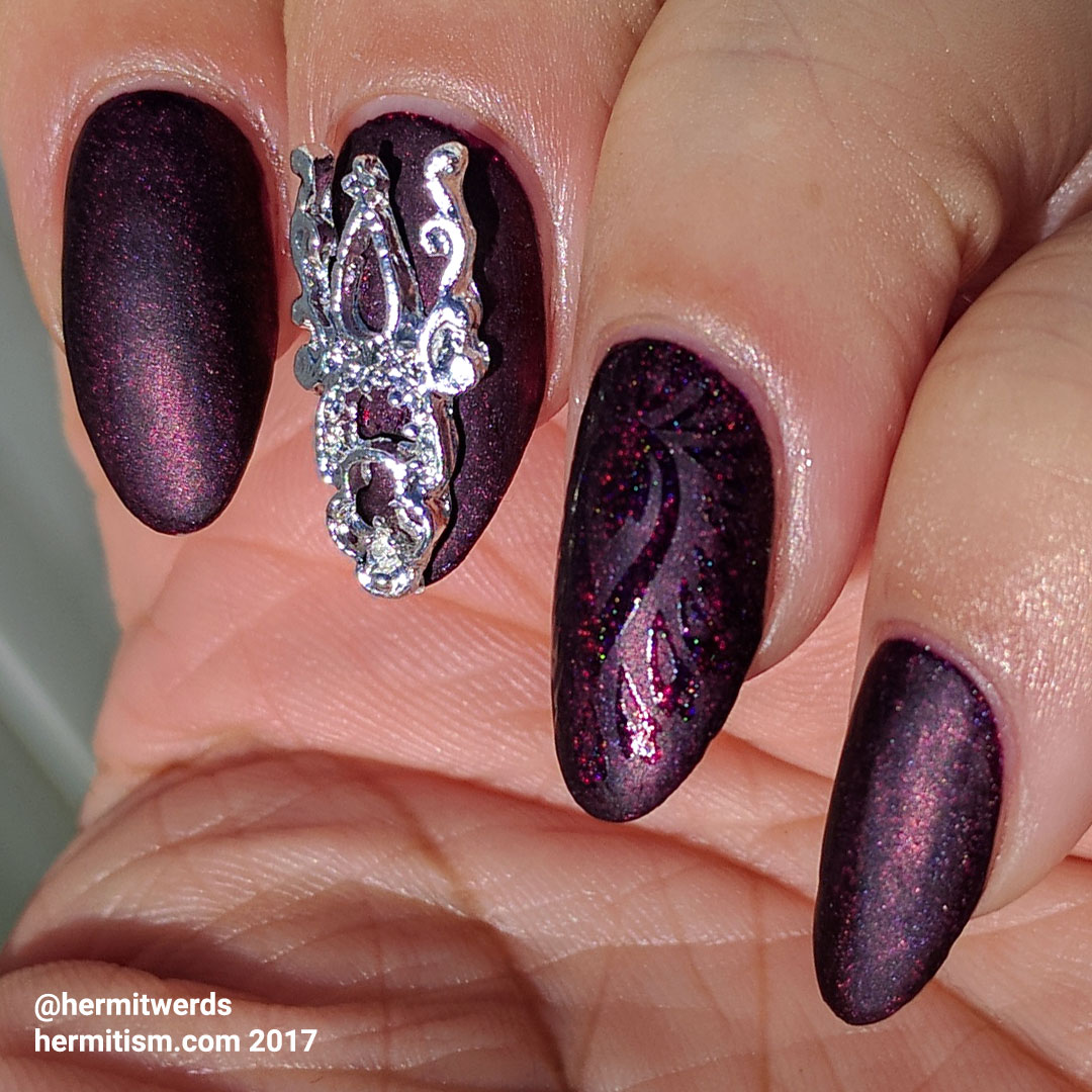 Vampy Matte - Hermit Werds - burgundy holographic matte mani with silver nail shield and glossy stamping