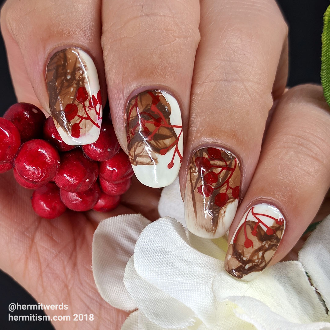 Mystery Berries - Hermit Werds - brown veil technique over white gel polish with red berries stamped on top