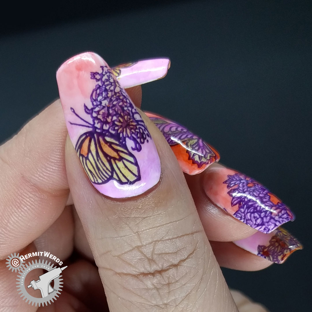 Garden Variety Butterflies - Hermit Werds - purple and orange watercolor-like nail art featuring butterflies that are half flower