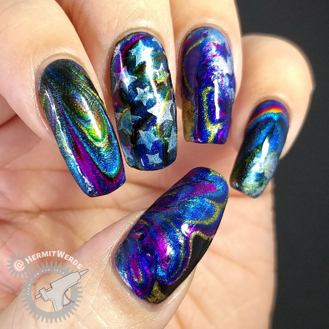 Metallic Stars - Hermit Werds - water marble nail art with a rainbow of metallic polishes and silver star outlines