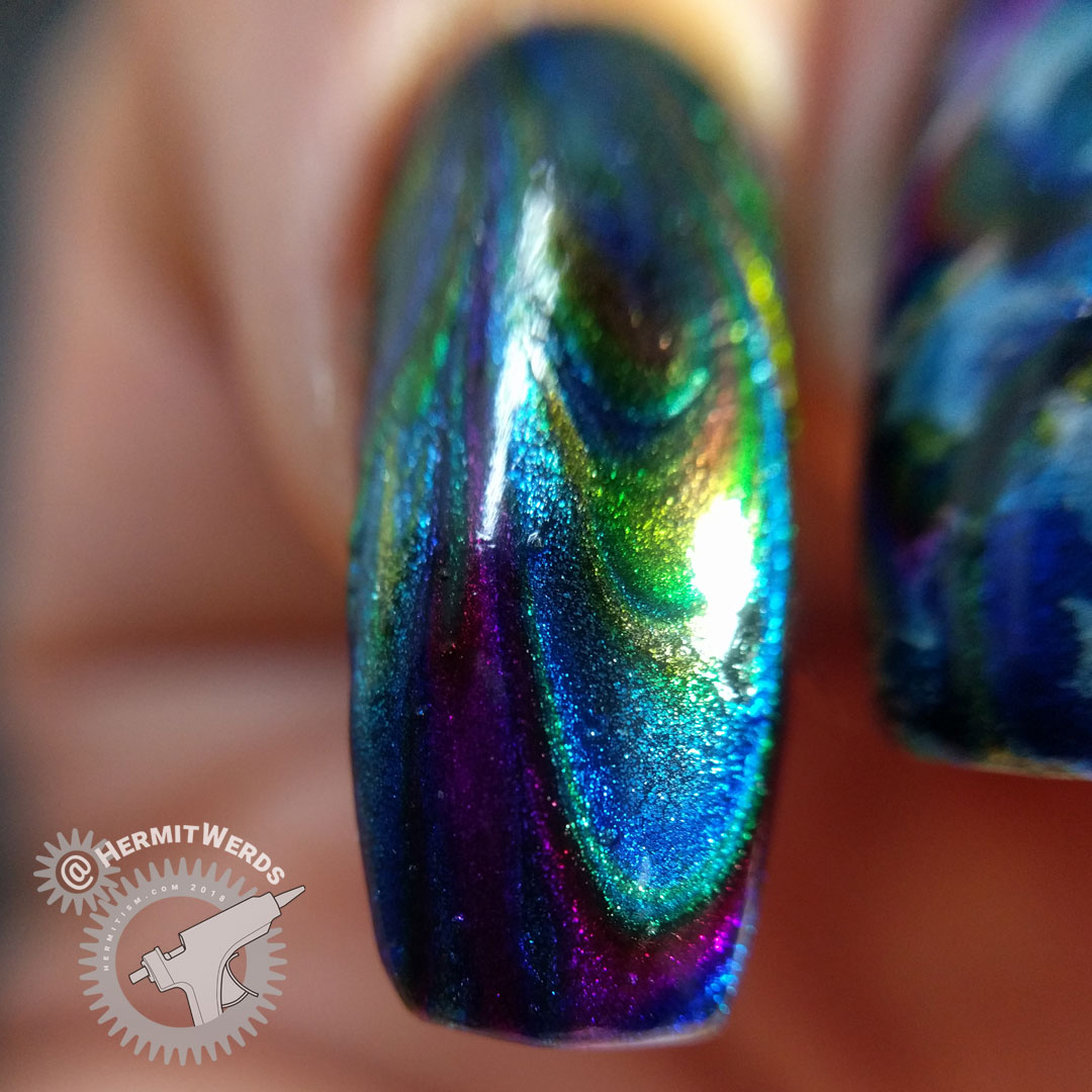 Metallic Stars (macro) - Hermit Werds - water marble nail art with a rainbow of metallic polishes