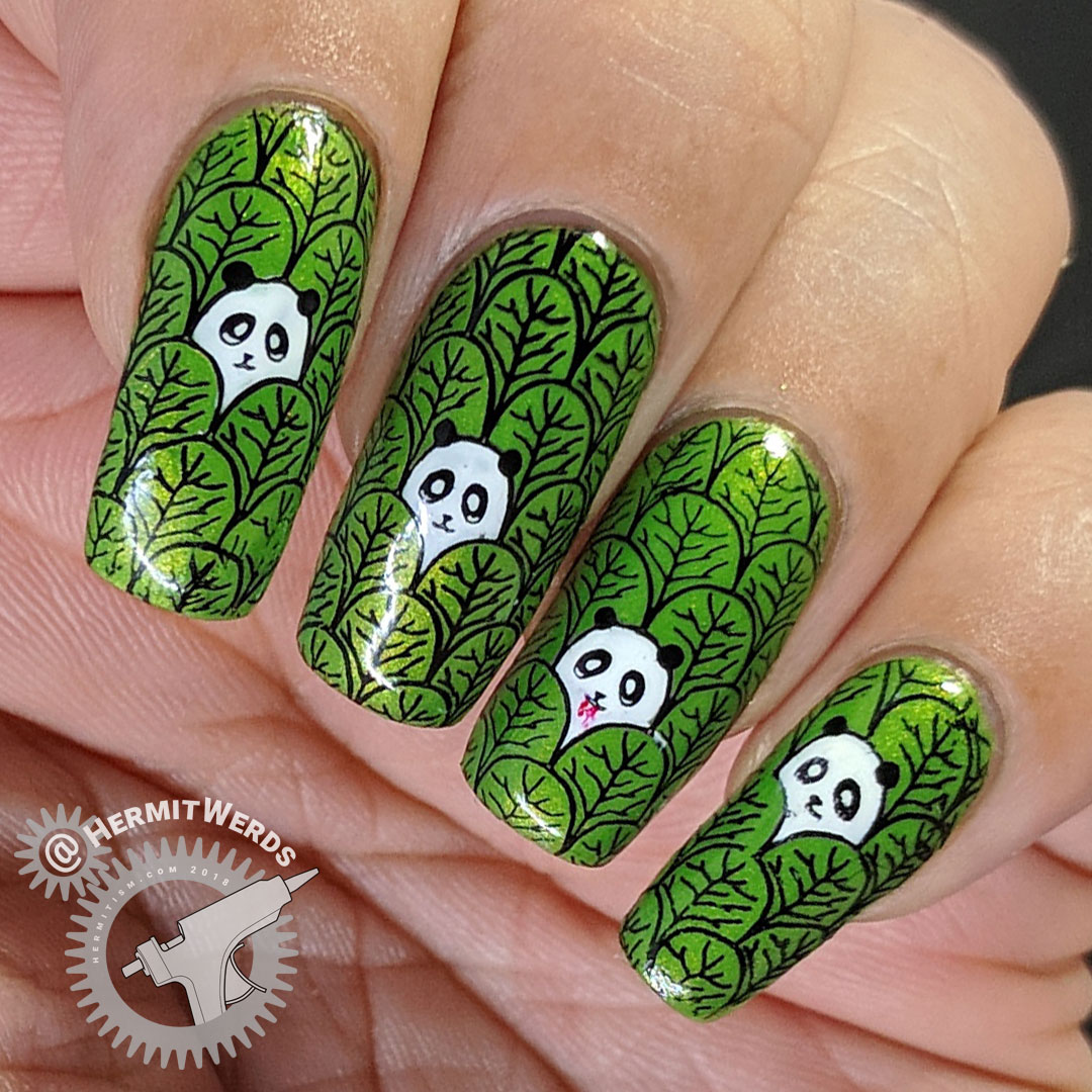 Panda Birthday - Hermit Werds - nail art of pandas peeking out of a forest of leaves, on is a vampire!