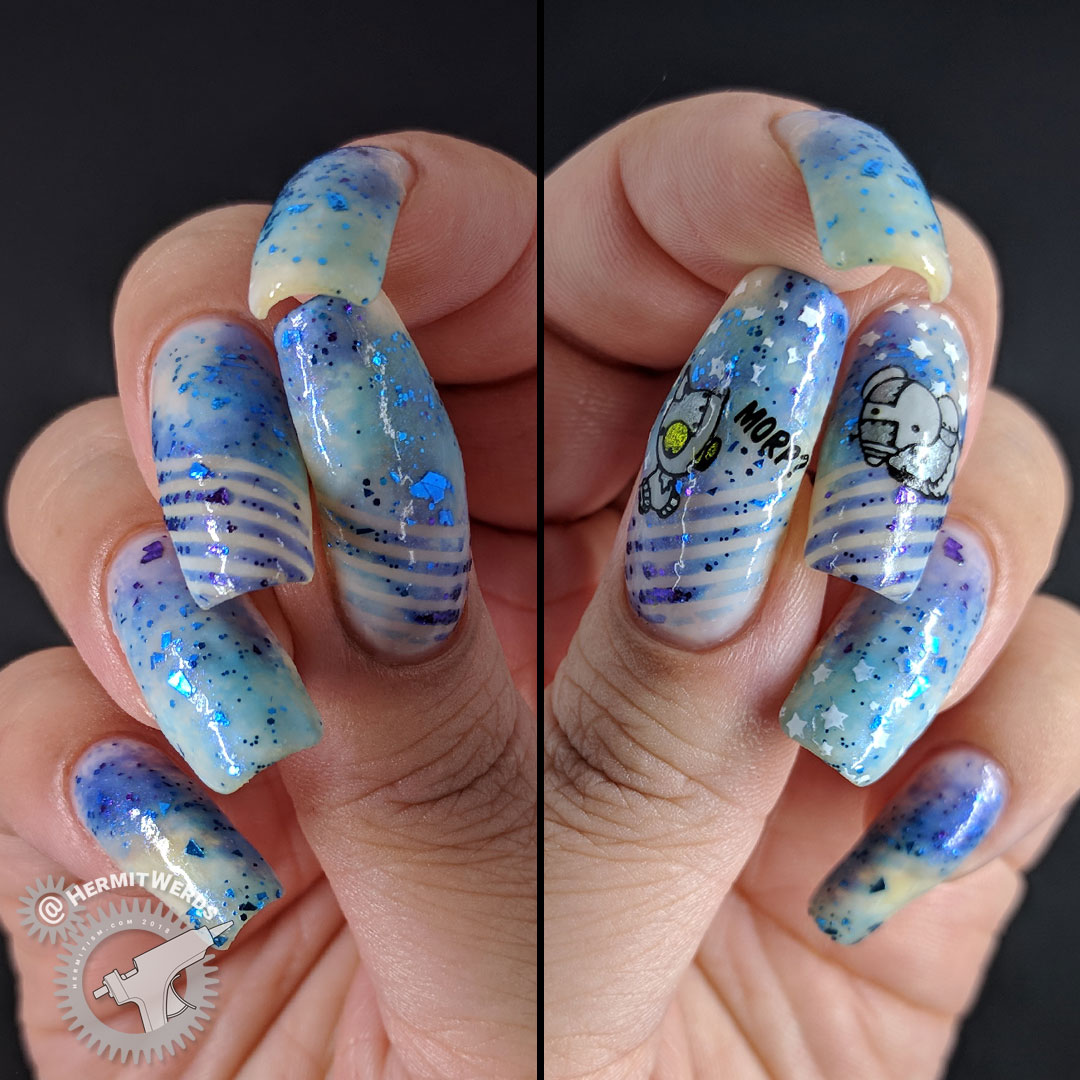 The Robots Remain - Hermit Werds - nail art of little robots against a galactic sky of stars