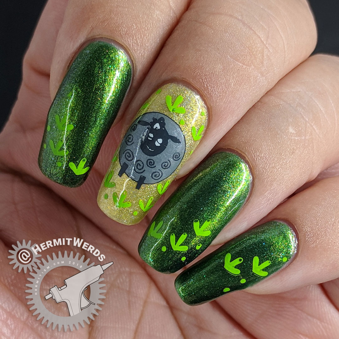 Black Sheep, Green Meadow - Hermit Werds - green nail art with a black sheep stamped on top