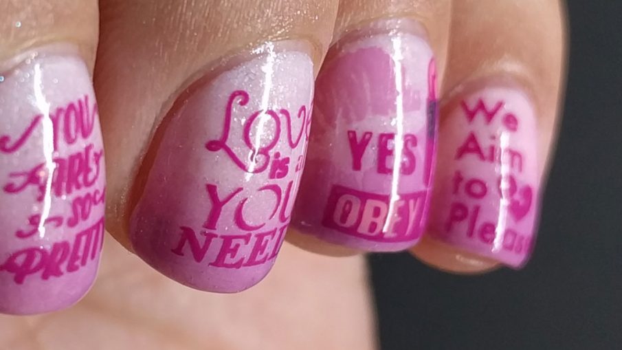 Women's Equality Day - Hermit Werds - pink nail art with stamped messages women often hear that hold them back