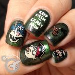 Carry Rum - Hermit Werds - green shimmer nail art with pirate crew decals and a hook holding a bottle of rum "Keep Calm and Carry Rum"