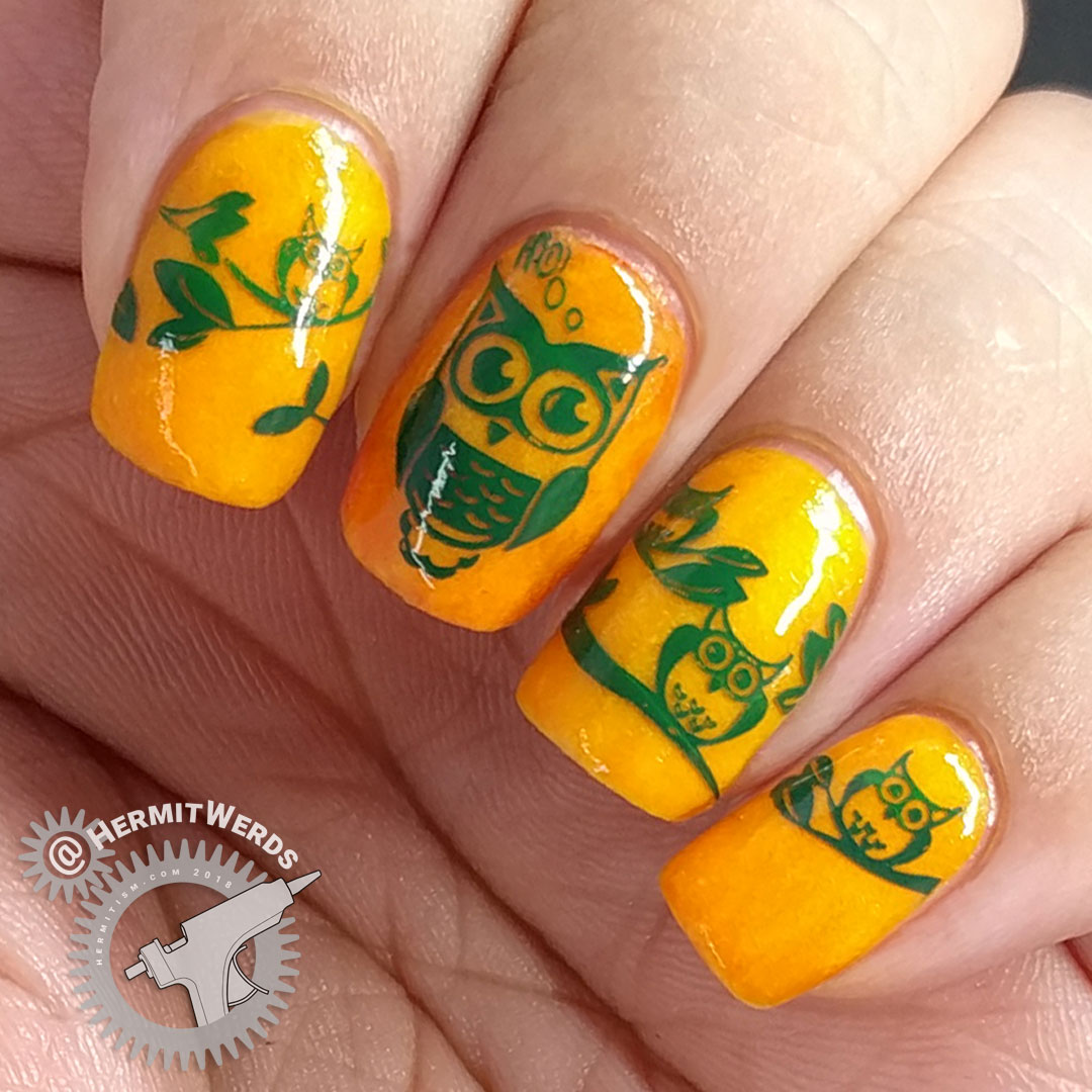 Hoo-nted Woods - Hermit Werds - orange glow in the dark Halloween nail art with green stamped owls