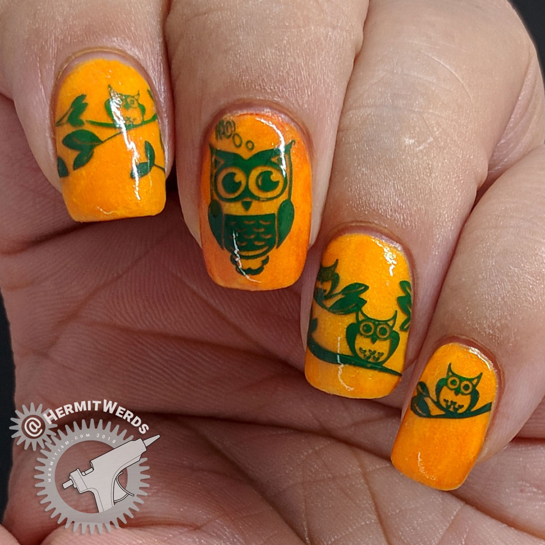 Hoo-nted Woods - Hermit Werds - orange glow in the dark Halloween nail art with green stamped owls