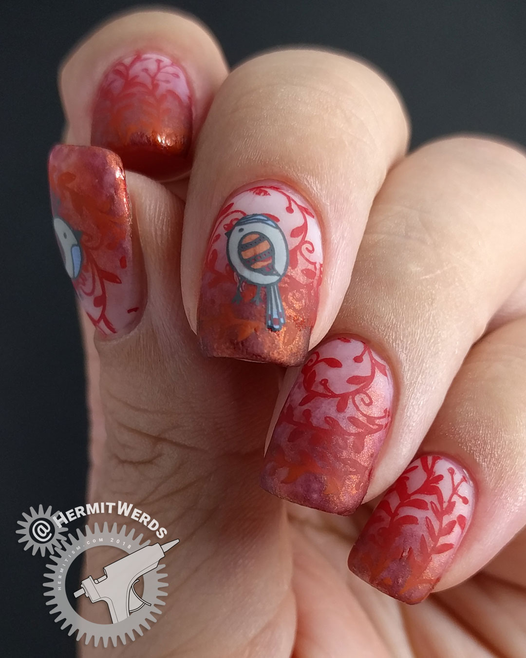 Birds of Fall - Hermit Werds - nail art of a sweet little fall birds on a duochrome red leaf background