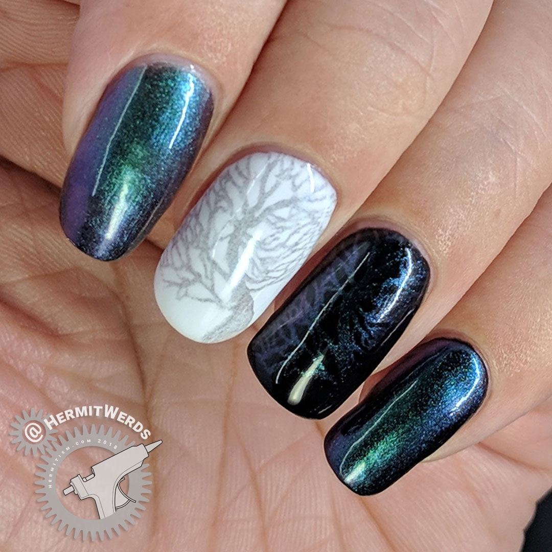 BeautyBigBang Duochrome Swatch J6504TM-1A - Hermit Werds - green to blue to magenta duochrome stamping swatch on natural nail, white, and black