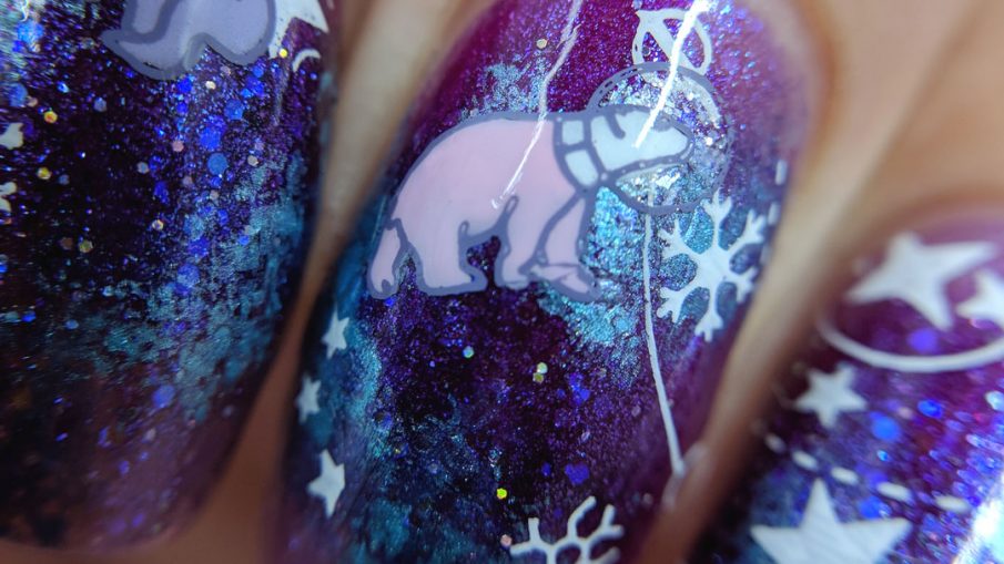 Galactic Snowstorm - Hermit Werds - purple, magenta, and blue galaxy nail art with snow flakes, sparkly glitter, and astronaut rabbit, polar bear, and penguin stamping decals