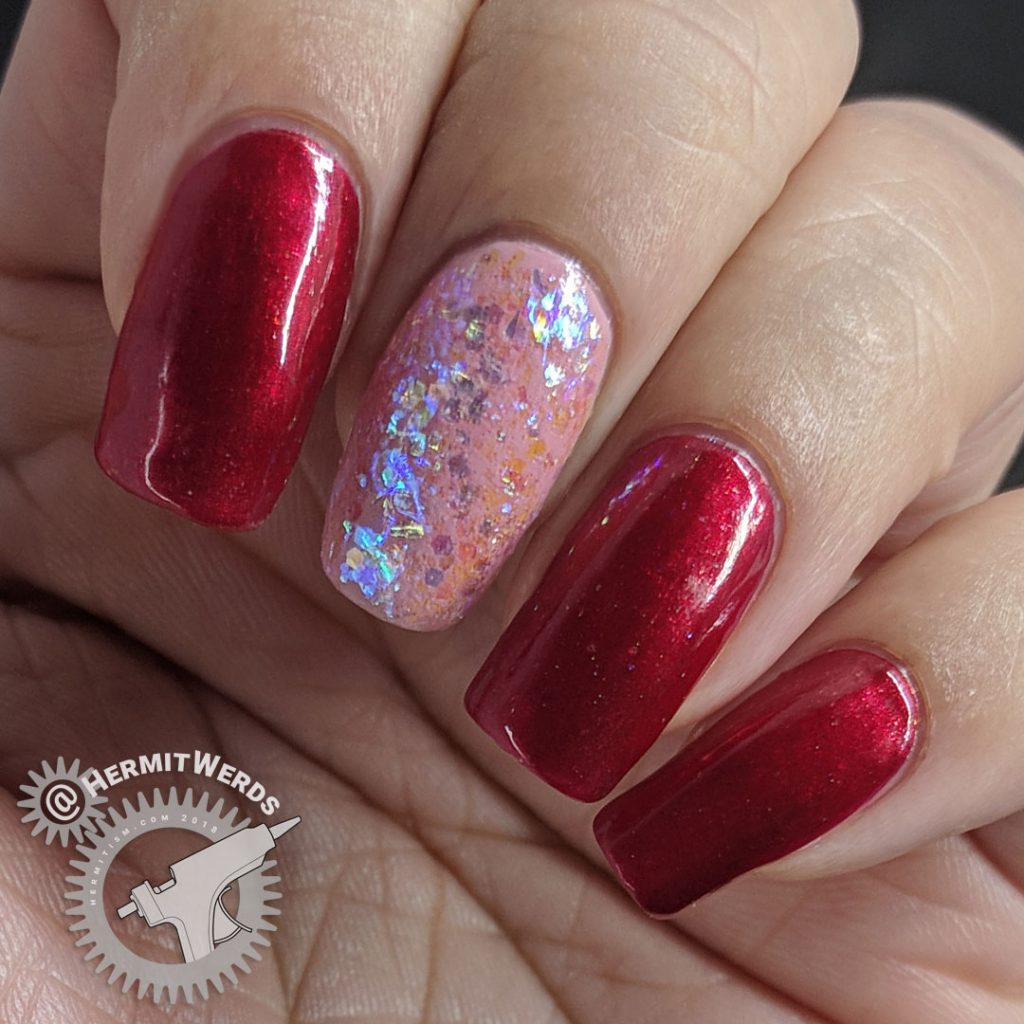 Red & Pink Base - Hermit Werds - red manicure with a pink accent nail covered with iridescent glitter