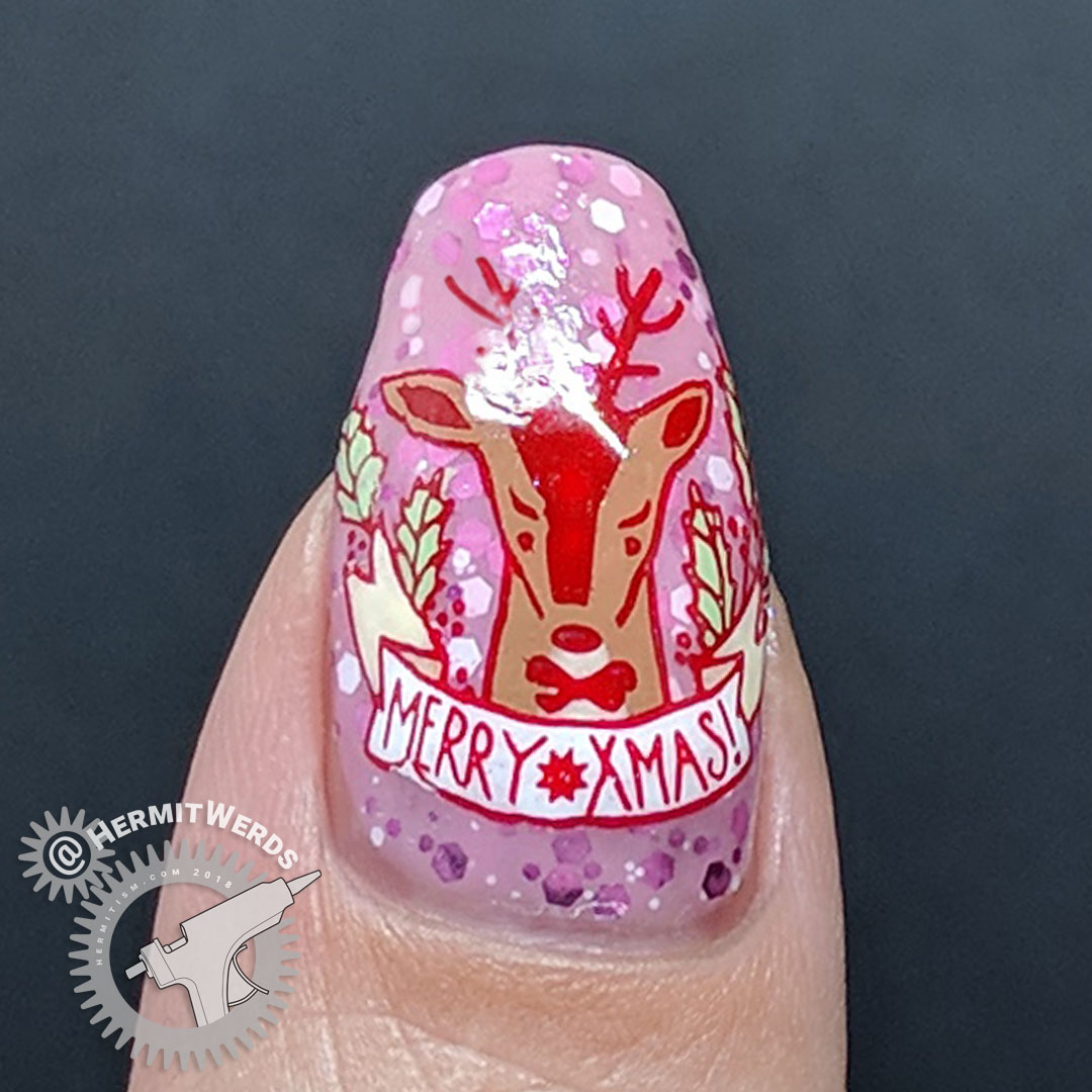 Reindeer X-mas - Hermit Werds - nail art of a pink glittery crelly with reindeer with a "Merry X-mas" message on top
