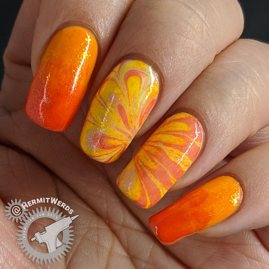Citrus Water Marble - Hermit Werds - sparkly orange water marble nail art