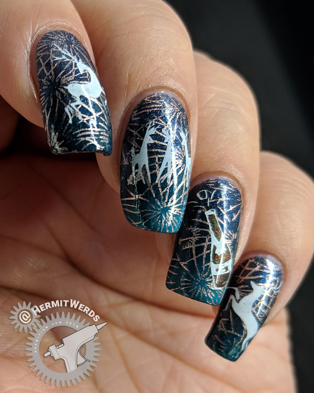 Reindeer Afterparty - Hermit Werds - teal nail art with partying reindeer and fireworks stamped on top