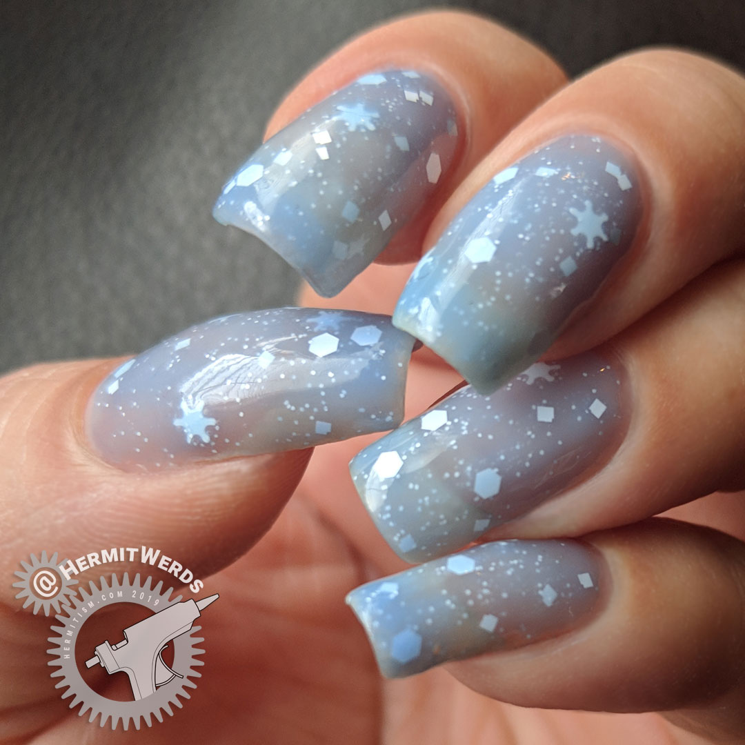 Shinespark Polish's "Flake On!" - Hermit Werds - swatch of a blue thermal snowflake crelly