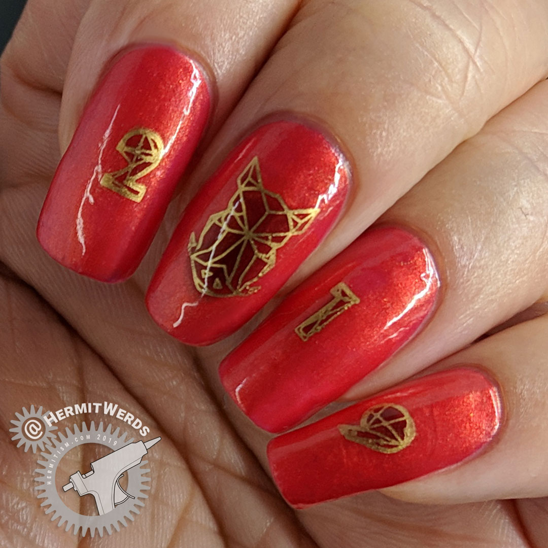 Celestial Year of the Pig - Hermit Werds - red and gold nail art for Chinese New Year's Year of the Pig complete with geometric boar's head