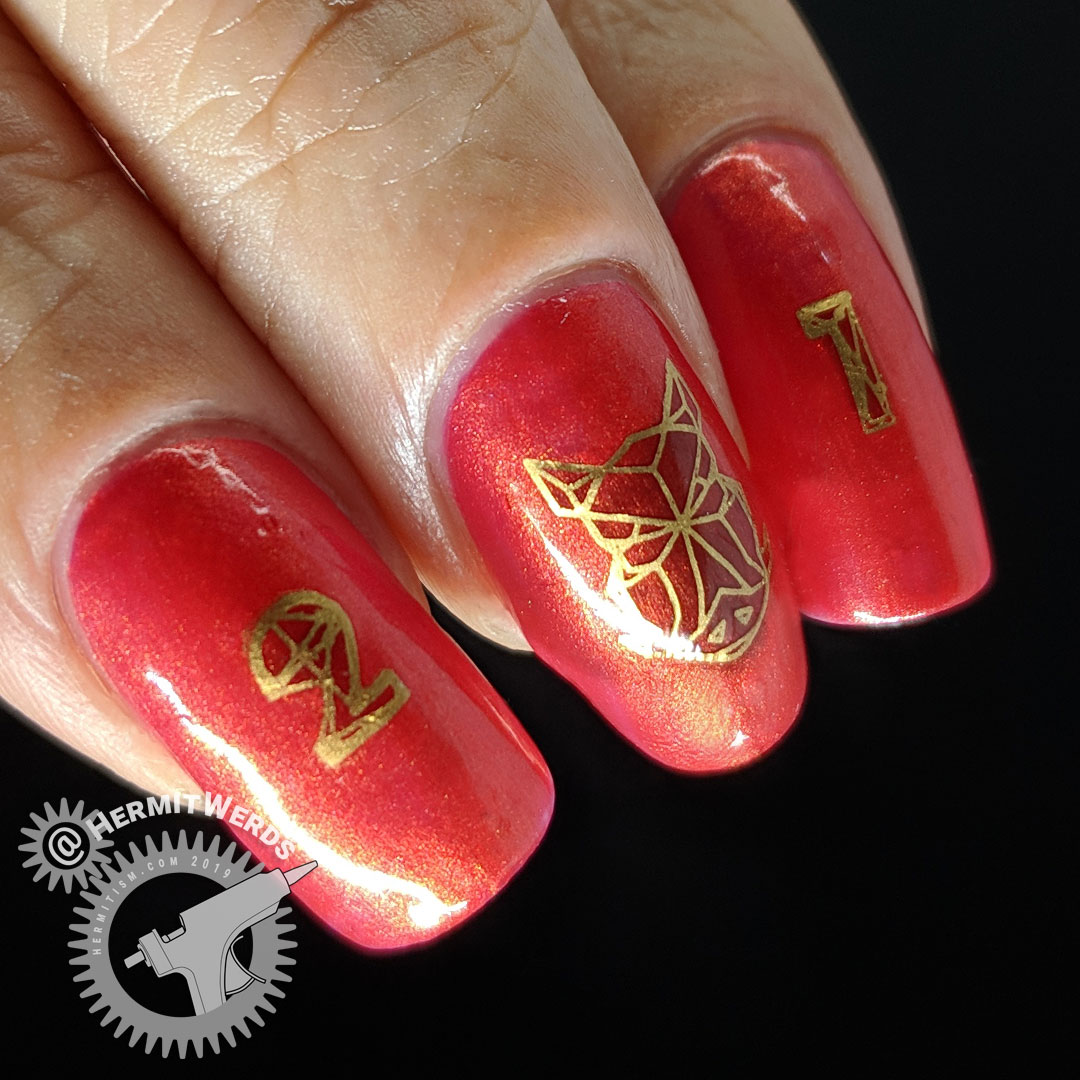 Celestial Year of the Pig - Hermit Werds - red and gold nail art for Chinese New Year's Year of the Pig complete with geometric boar's head
