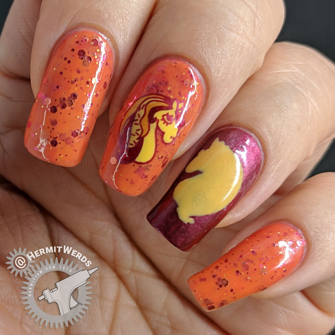 Crelly-corn - Hermit Werds - nail art of a crazy cool unicorn facing a unicorn silhouette against an orange crelly background