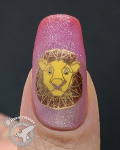 Geometric Lion - Hermit Werds - nail art with geometric lion stamping decals on an orange/magenta/red thermal/solar polish with a dark gold accent nail