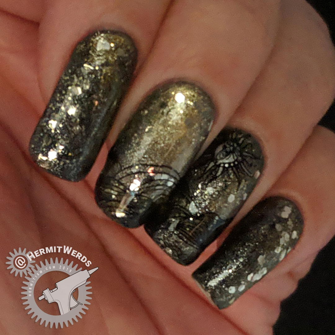 Magnetic Sol - Hermit Werds - nail art featuring a sun-baked landscape on a magnetic khaki background with a golden scatter of glitter "stars"