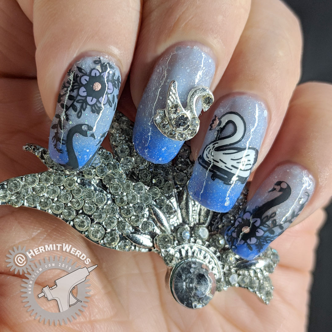 Swan Lake - Hermit Werds - a swan princess and rhinestone nail charm swan on a thermal/solar polish with attendant swans