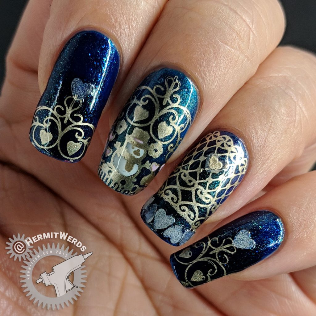 Winter's Love - Hermit Werds - blue chameleon nail art with golden lace, snowman, and hearts including glow in the dark hearts