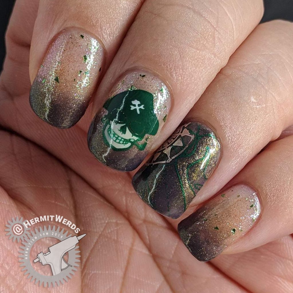 Brown and green skeletal pirate nail art with map and compass.