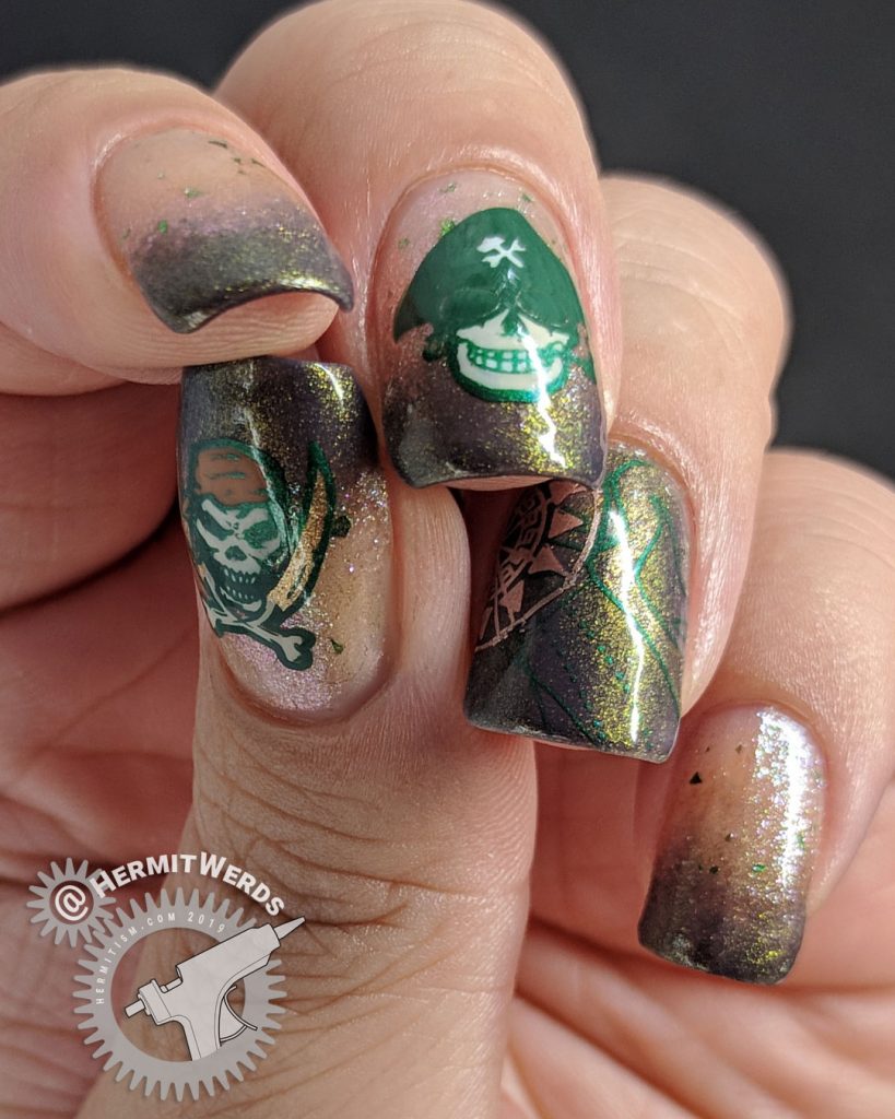 Brown and green skeletal pirate nail art with map and compass.