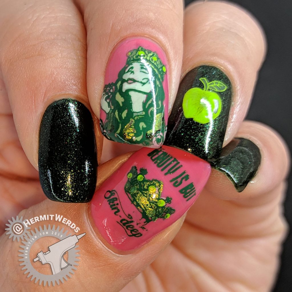 Green and pink nail art featuring the Evil Queen and her apple from Snow White.