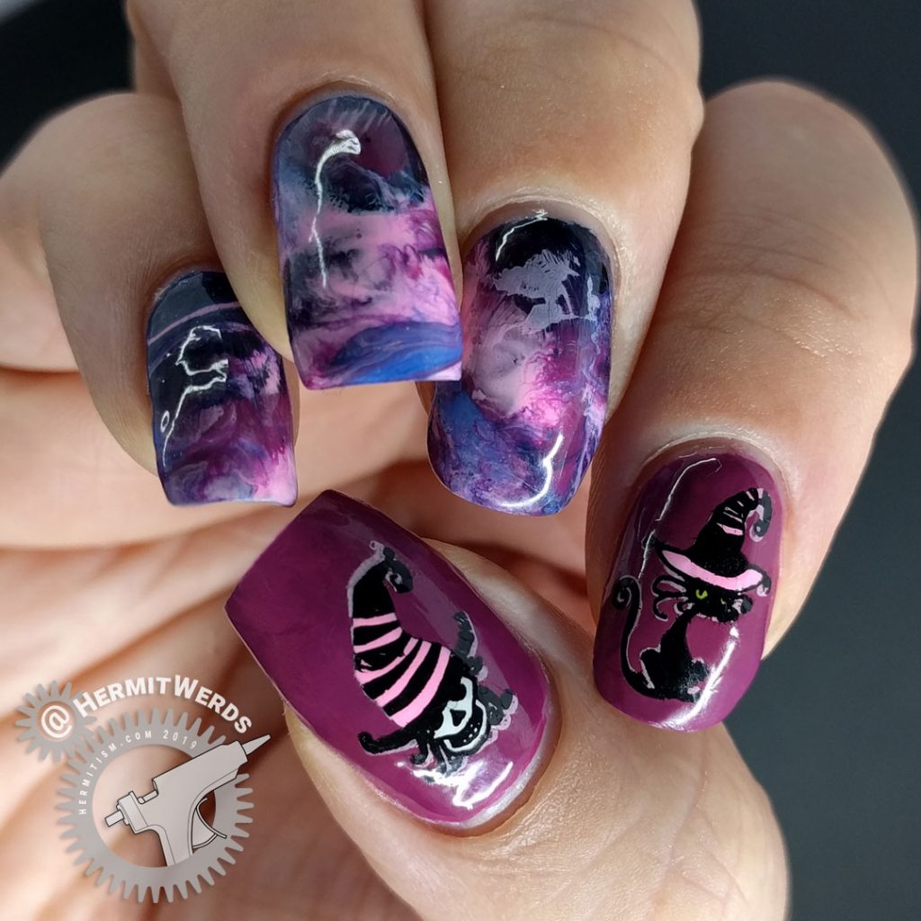 Purple, pink, and blue smoosh marble nail art with fabulously hat-ed witch and black cat familiar.