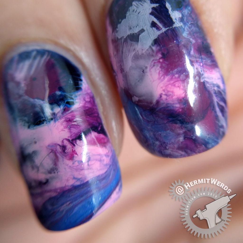 Purple, pink, and blue smoosh marble nail art with fabulously hat-ed witch and black cat familiar.