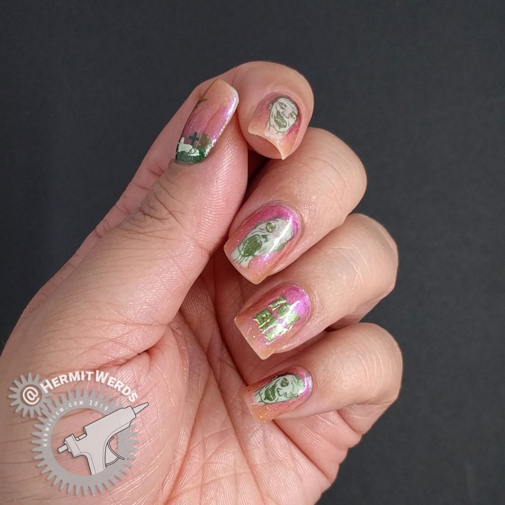 A delicately gruesome zombie nail art using a translucent shimmery orange polish and soft metallic green zombies.