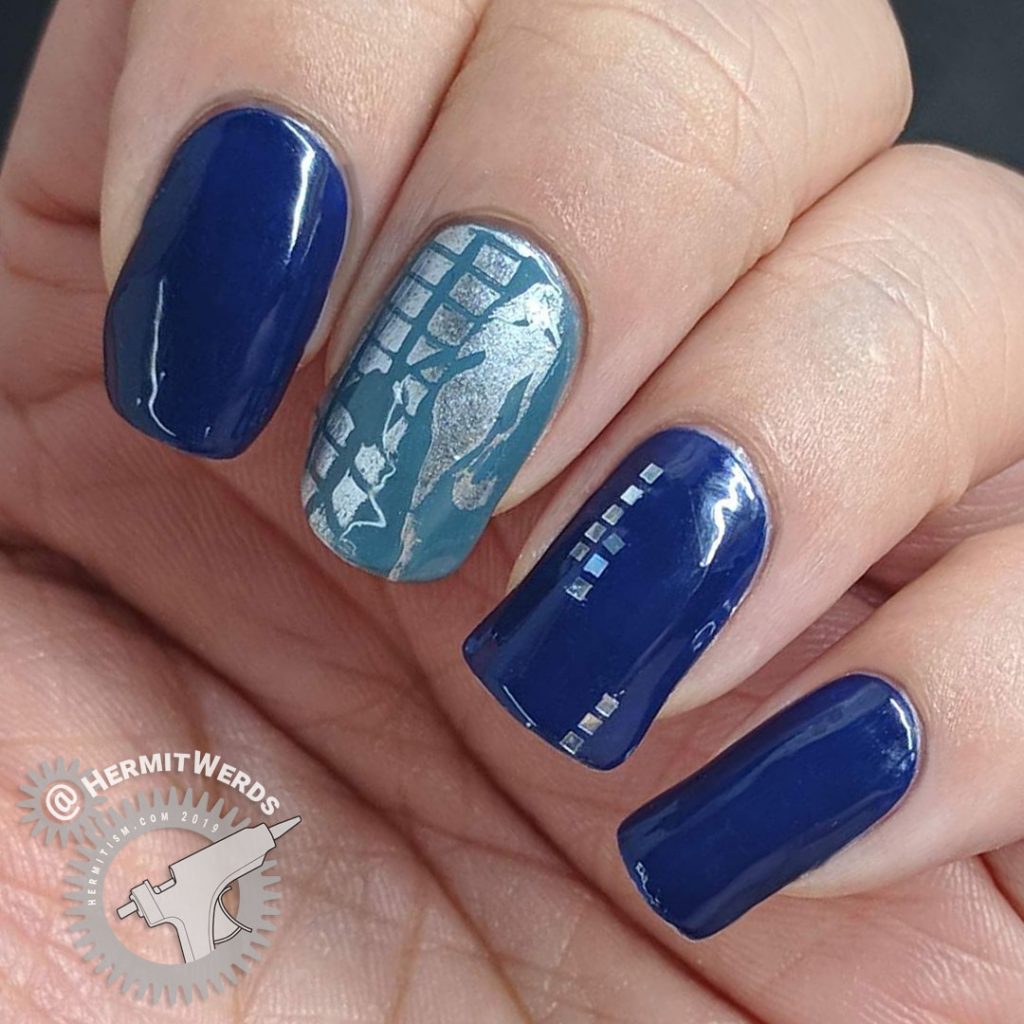 Blue nail art with holographic silver squares and a glamourous lady shopper