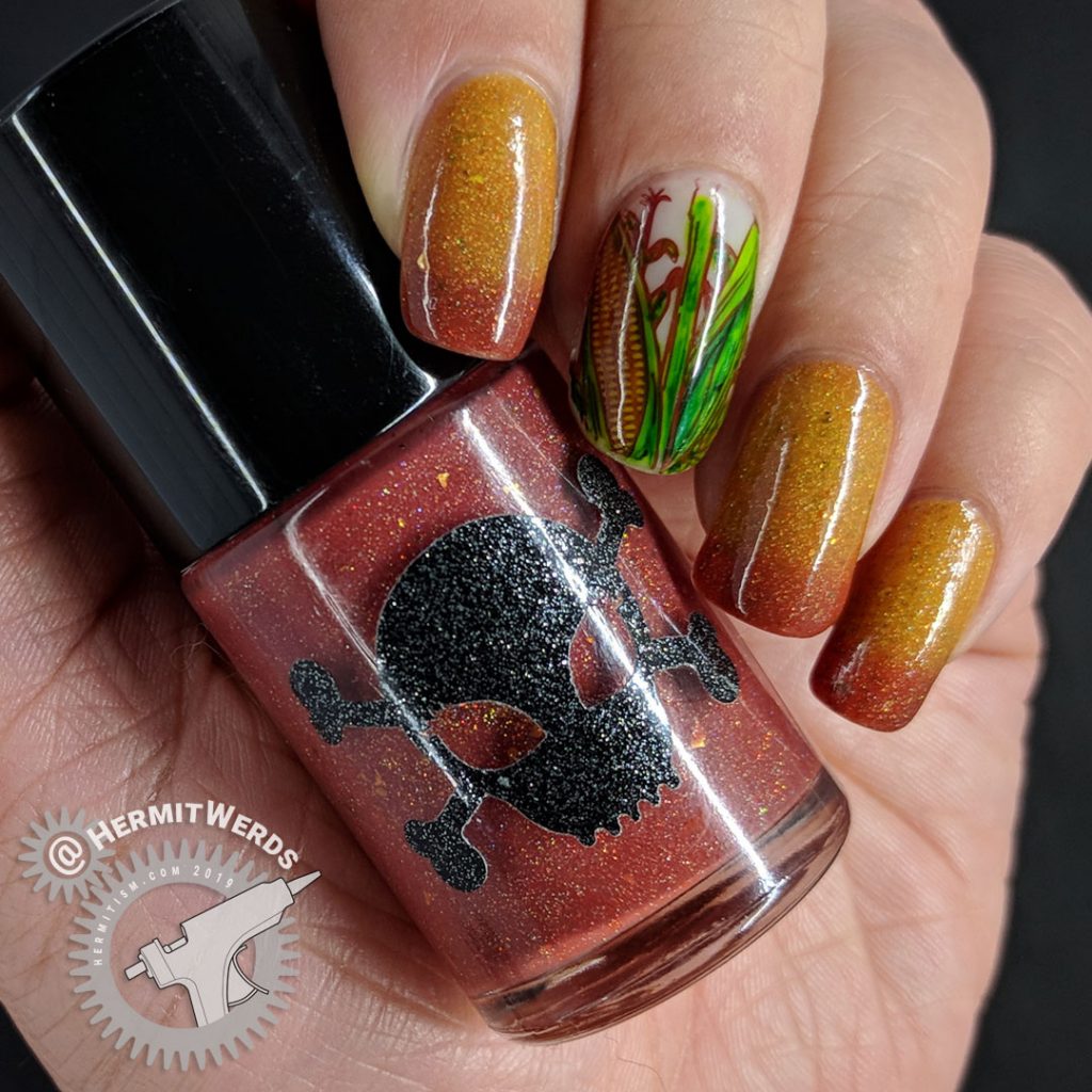 Mustard and terracotta thermal polish with corn decals colored in with Sharpie markers.