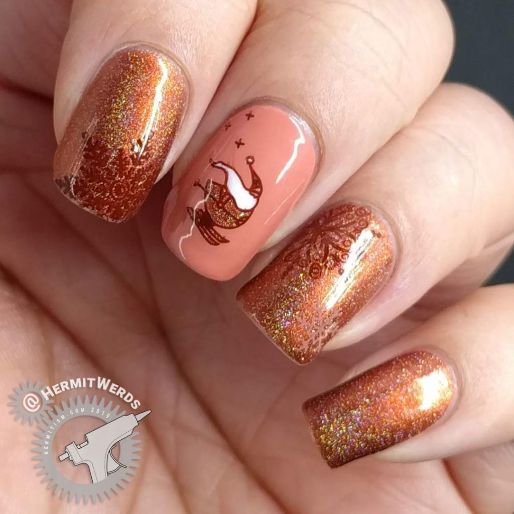 Adorable skiing Santa nail art with an orange holographic color scheme and snow flake stamps.