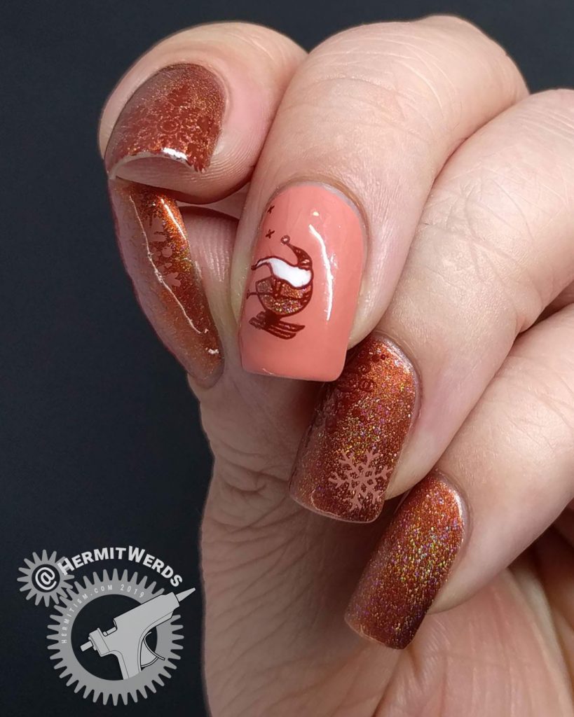 Adorable skiing Santa nail art with an orange holographic color scheme and snow flake stamps.