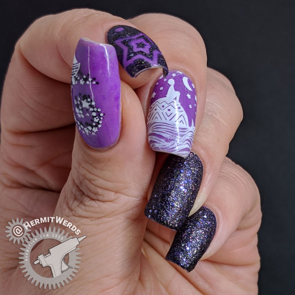 Dreamy purple glow in the dark nail art with a child stargazing on the back of a whale.