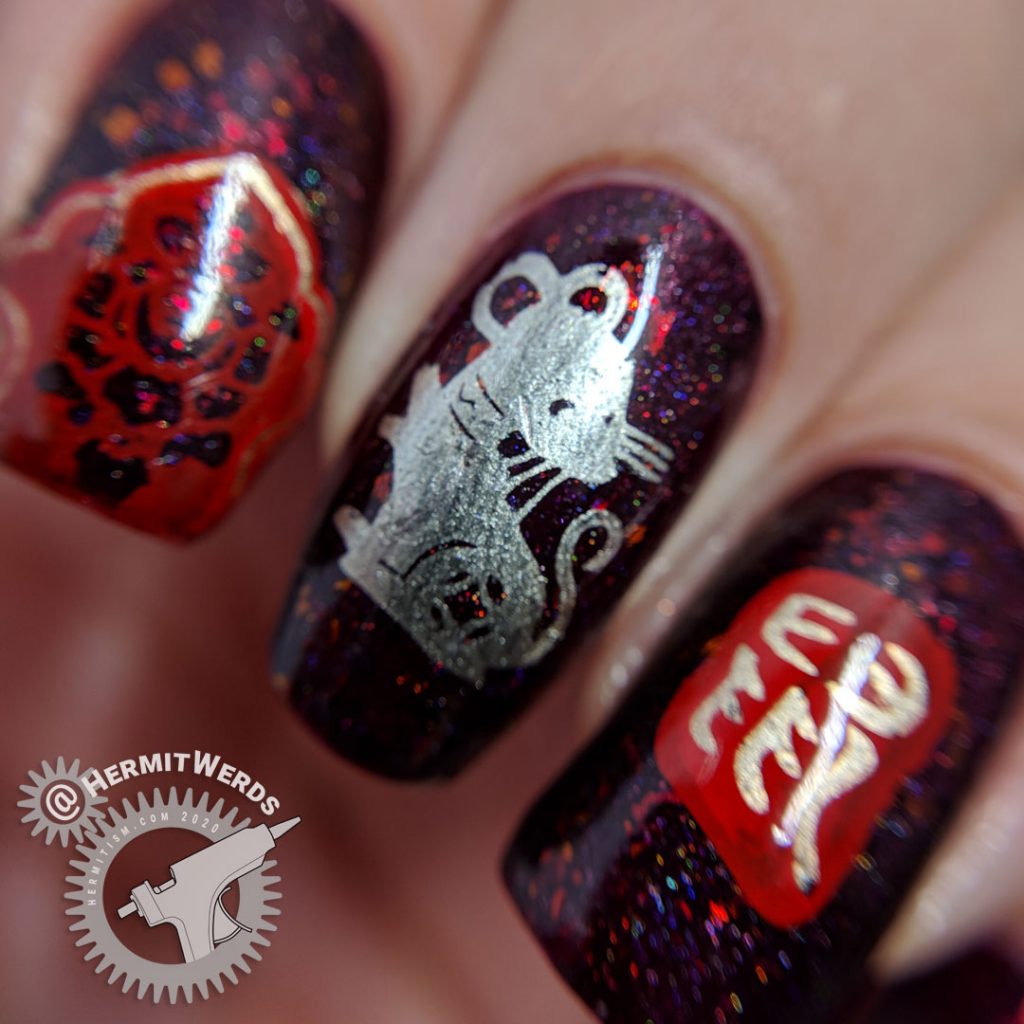 Year of the Rat nail art with a deep red base and Chinese paper cutting stamping images of rats.