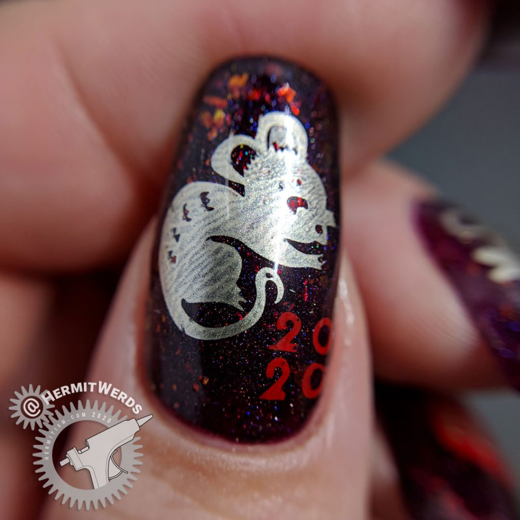 Year of the Rat nail art with a deep red base and Chinese paper cutting stamping images of rats.