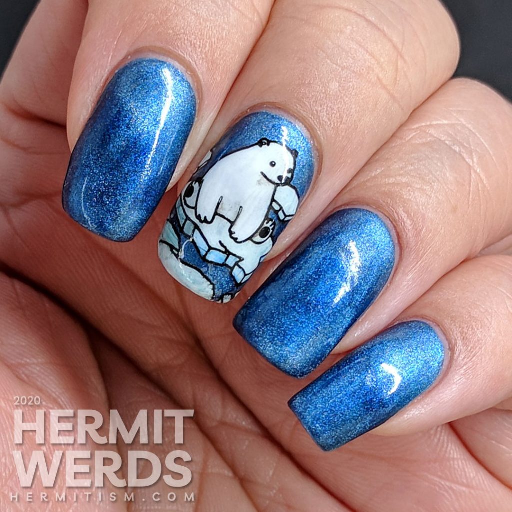 Classic blue magnetic nail art with adorable fish-loving polar bear stamping decals.