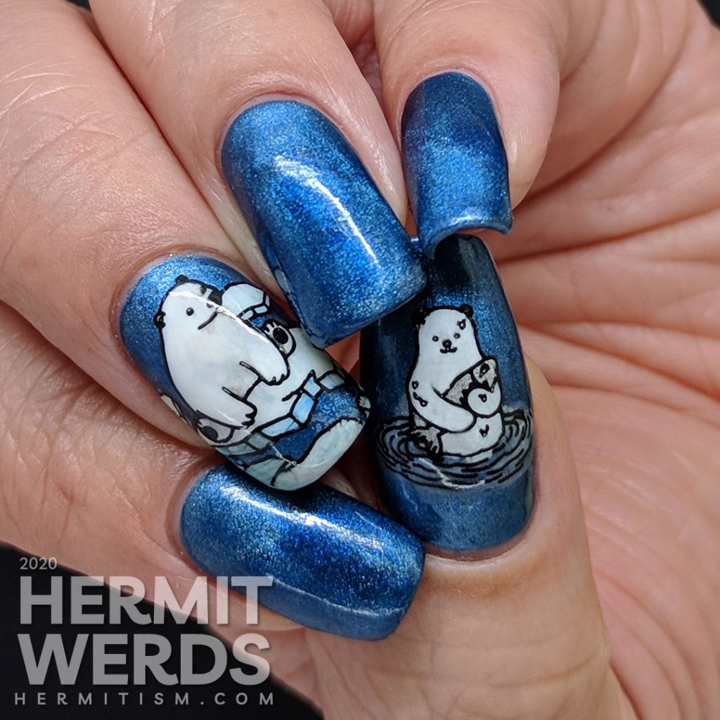 Classic blue magnetic nail art with adorable fish-loving polar bear stamping decals.