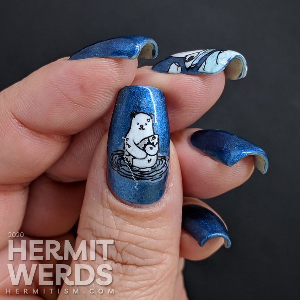 Classic blue magnetic nail art with adorable fish-loving polar bear stamping decals.