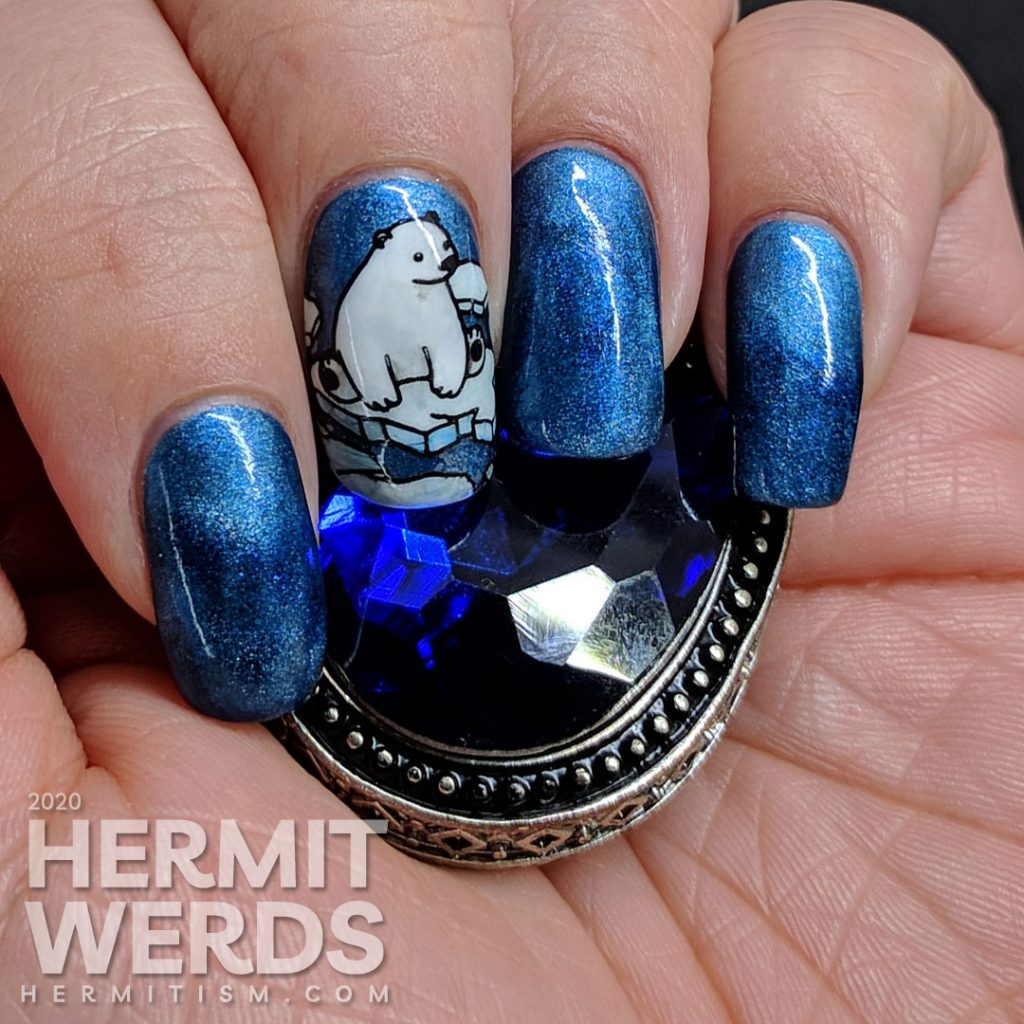 Classic blue magnetic nail art with adorable fish-loving polar bear stamping decals.