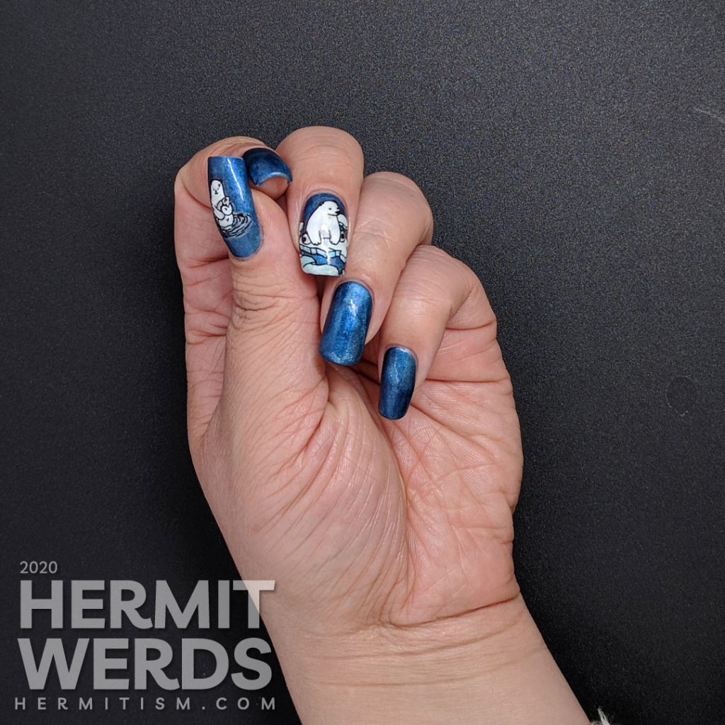 Classic blue magnetic nail art with adorable fish-loving polar bear stamping decals.