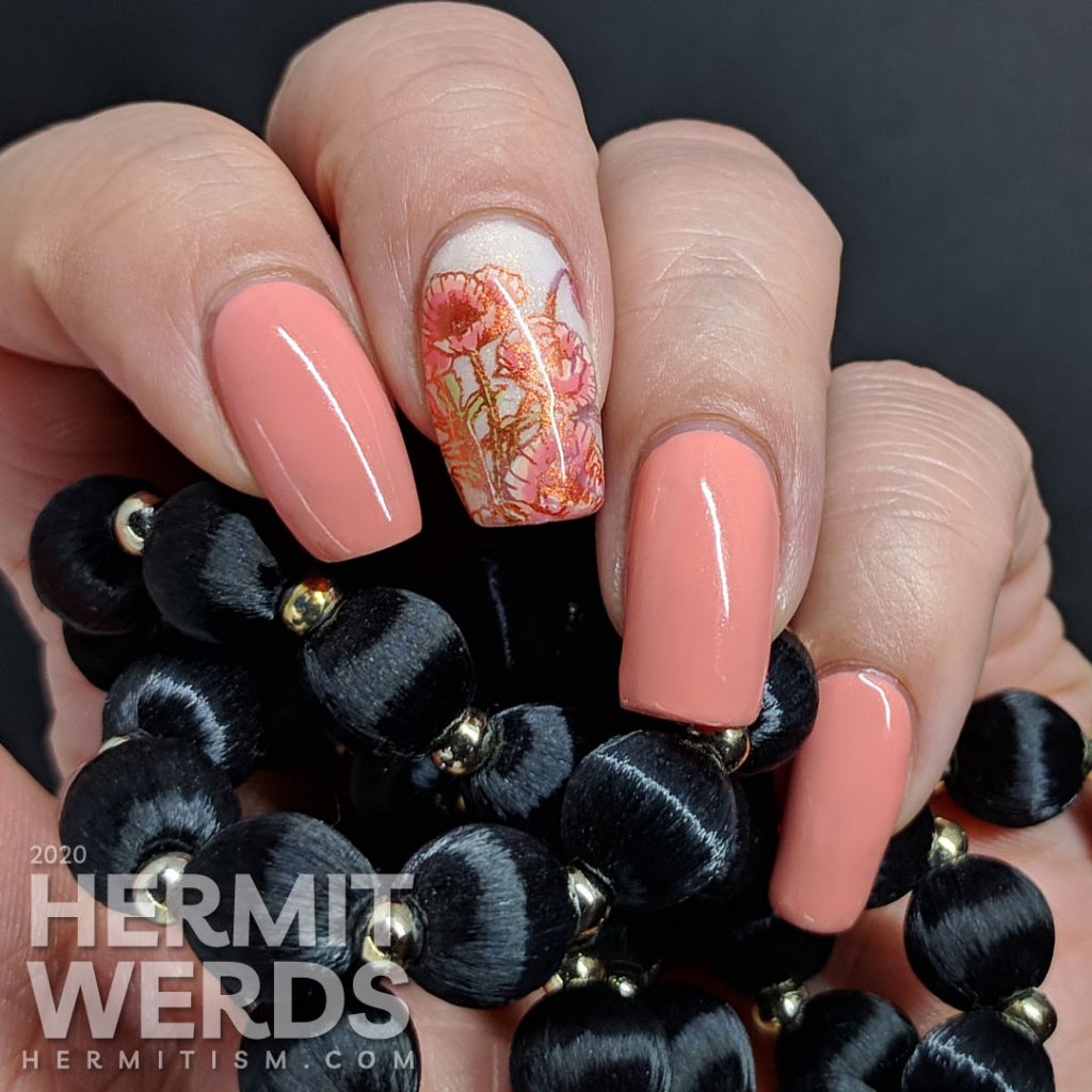 Soft peachy pink nail art with poppy reverse stamped accent nails.