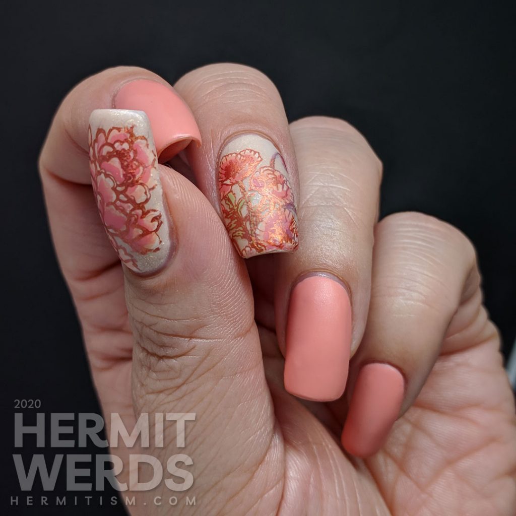 Soft peachy pink nail art with poppy reverse stamped accent nails.