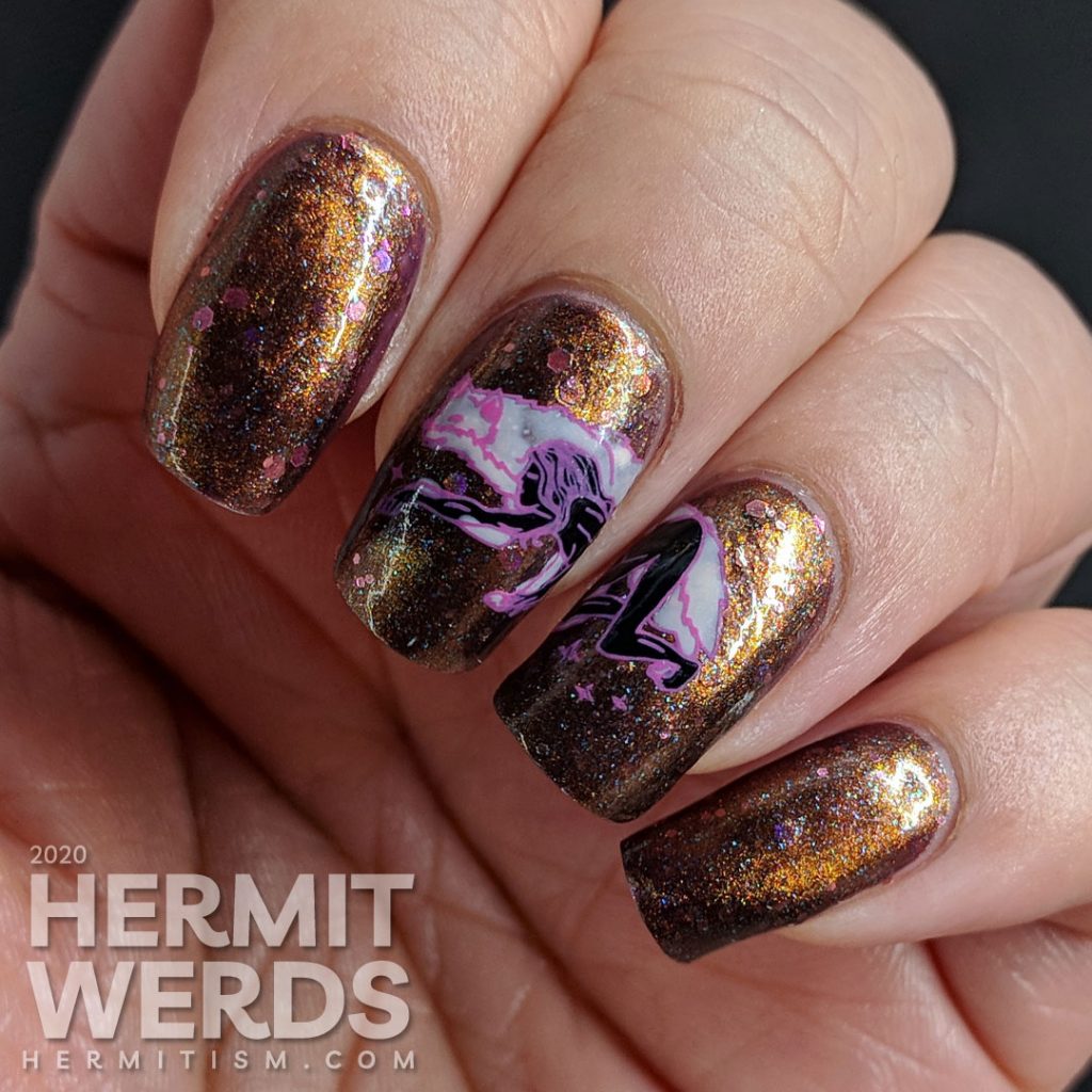 Coppery magnetic nail art with spirit animal wolf stamping images (or werewolf if that's how you see it).