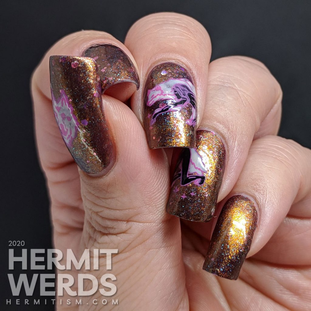 Coppery magnetic nail art with spirit animal wolf stamping images (or werewolf if that's how you see it).